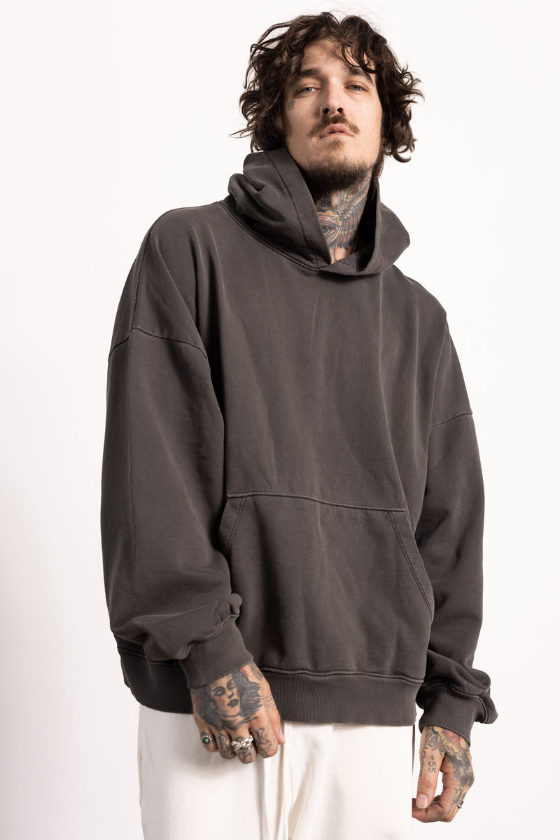 White male model with edgy style and tattoos wearing a Drop Shoulder Pima Cotton Hoodie