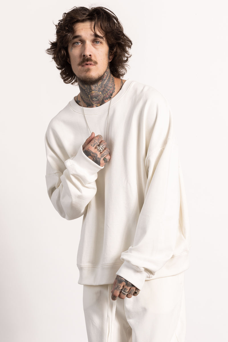 White male model with edgy style wearing a heavyweight cotton crewneck sweatshirt.