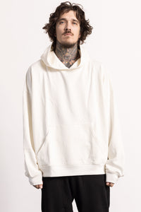 White male model with edgy style and tattoos wearing an off while Drop Shoulder Pima Cotton Hoodie