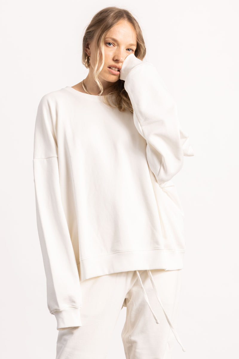 White female model with edgy style wearing a heavyweight Pima Cotton Crewneck Sweatshirt